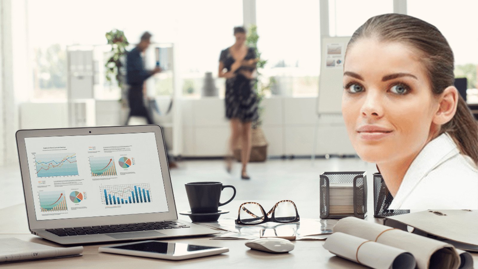 Business owner working at a desk in a bright Phoenix office