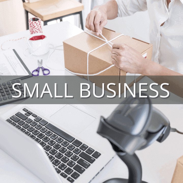 Small business owner working at a counter